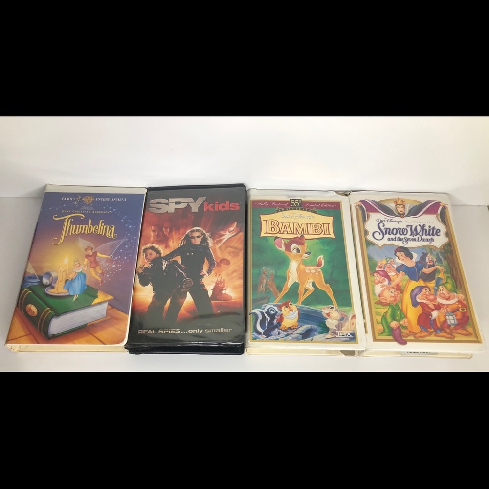 VHS Tapes(Spy Kids, Bambi, Thumbelina, Snow White)